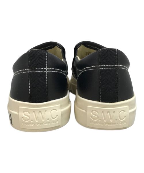 COMME des GARCONS JUNYA WATANABE MAN（コム デ ギャルソン ジュンヤ ワタナベ マン）COMME des GARCONS JUNYA WATANABE MAN (コム デ ギャルソン ジュンヤ ワタナベ マン) SWC (ステファニー ワーカーズ クラブ) スリッポン ブラック サイズ:41の古着・服飾アイテム
