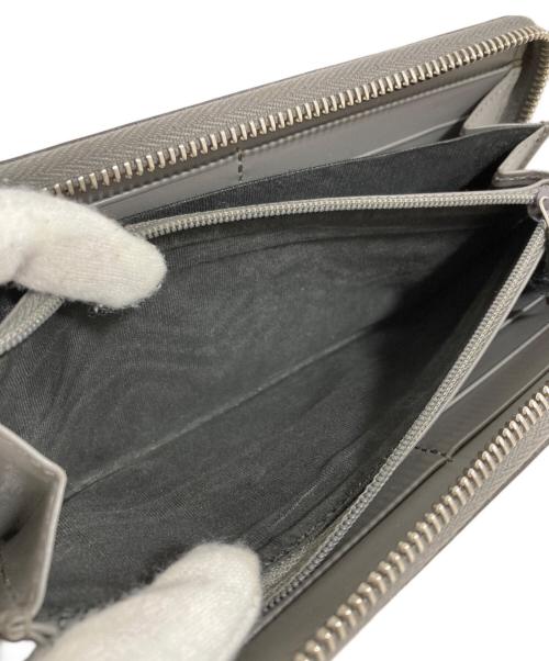 GUCCI（グッチ）GUCCI (グッチ) GGエンボスアラウンドジップウォレット グレーの古着・服飾アイテム