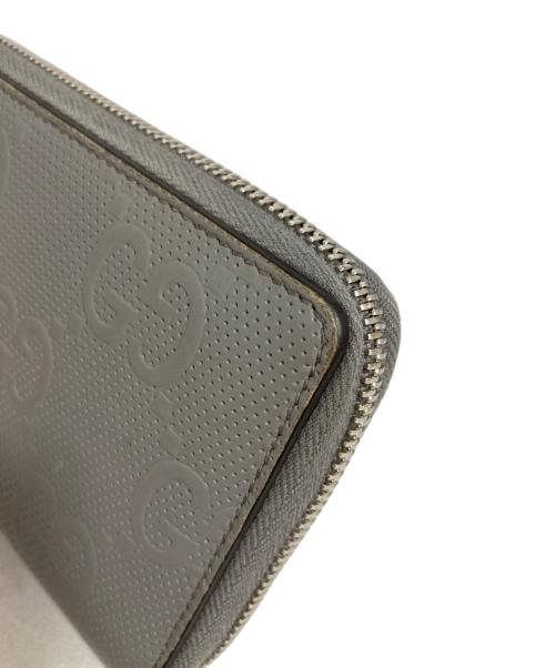 GUCCI（グッチ）GUCCI (グッチ) GGエンボスアラウンドジップウォレット グレーの古着・服飾アイテム