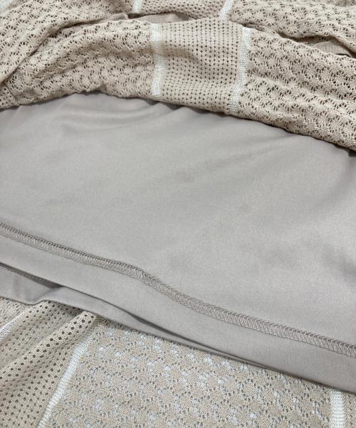 anuans（アニュアンス）anuans (アニュアンス) アシメティアード透かし編みニットワンピース ベージュ サイズ:Freeの古着・服飾アイテム