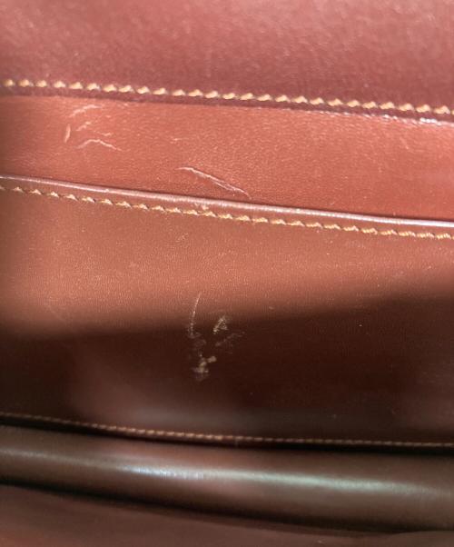 must de cartier（マストドゥカルティエ）must de cartier (マストドゥカルティエ) ショルダーバッグ レッドの古着・服飾アイテム