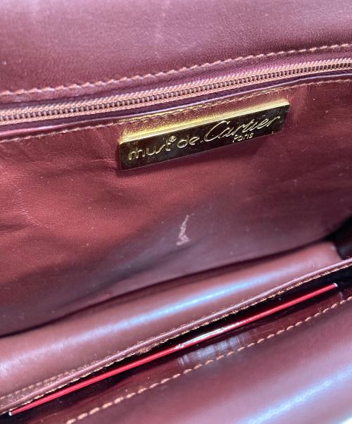 must de cartier（マストドゥカルティエ）must de cartier (マストドゥカルティエ) ショルダーバッグ レッドの古着・服飾アイテム