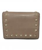 VALENTINOヴァレンティノ）の古着「ロックスタッズ2つ折り財布」｜ベージュ