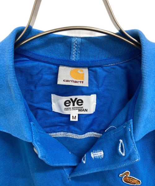 eYe COMME des GARCONS JUNYAWATANABE MAN（アイ コム デ ギャルソン ジュンヤ ワタナベ マン）eYe COMME des GARCONS JUNYAWATANABE MAN (アイ コム デ ギャルソン ジュンヤ ワタナベ マン) CarHartt (カーハート) ポロシャツ ブルー サイズ:Mの古着・服飾アイテム