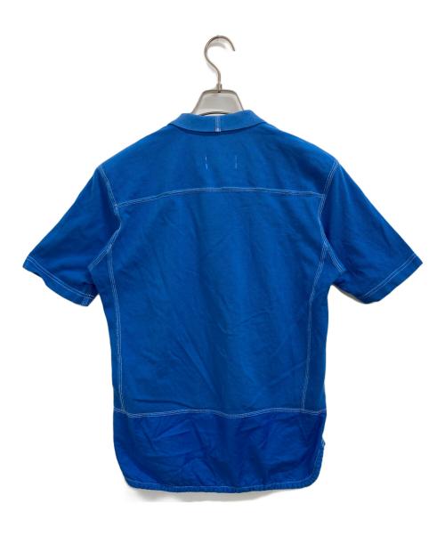 eYe COMME des GARCONS JUNYAWATANABE MAN（アイ コム デ ギャルソン ジュンヤ ワタナベ マン）eYe COMME des GARCONS JUNYAWATANABE MAN (アイ コム デ ギャルソン ジュンヤ ワタナベ マン) CarHartt (カーハート) ポロシャツ ブルー サイズ:Mの古着・服飾アイテム