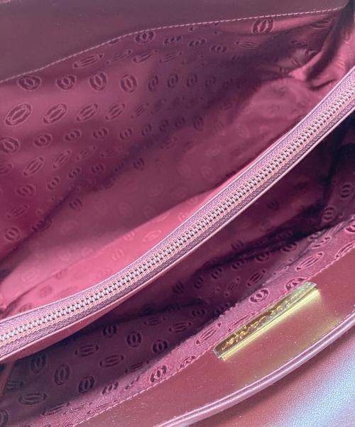 must de cartier（マストドゥカルティエ）must de cartier (マストドゥカルティエ) ショルダーバッグ レッドの古着・服飾アイテム