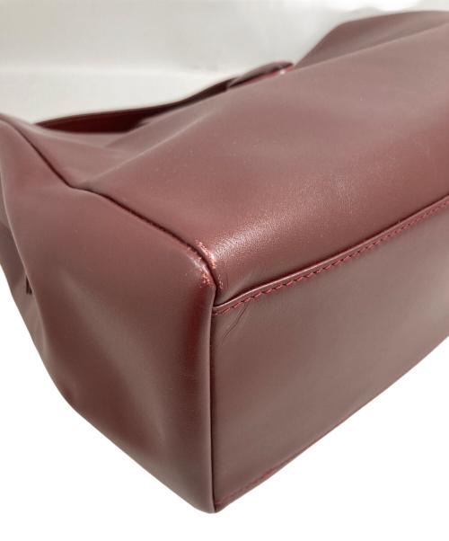 must de cartier（マストドゥカルティエ）must de cartier (マストドゥカルティエ) ショルダーバッグ レッドの古着・服飾アイテム