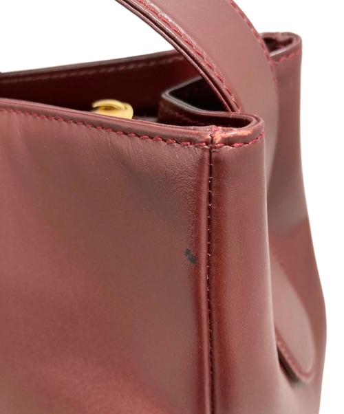 must de cartier（マストドゥカルティエ）must de cartier (マストドゥカルティエ) ショルダーバッグ レッドの古着・服飾アイテム