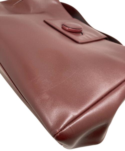 must de cartier（マストドゥカルティエ）must de cartier (マストドゥカルティエ) ショルダーバッグ レッドの古着・服飾アイテム