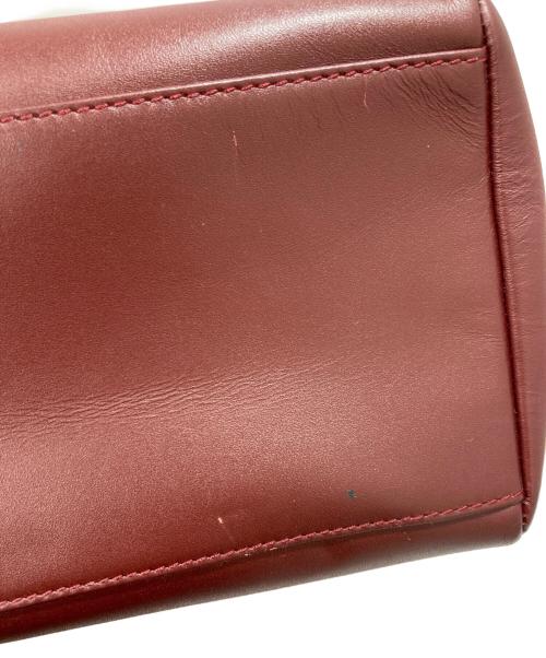 must de cartier（マストドゥカルティエ）must de cartier (マストドゥカルティエ) ショルダーバッグ レッドの古着・服飾アイテム