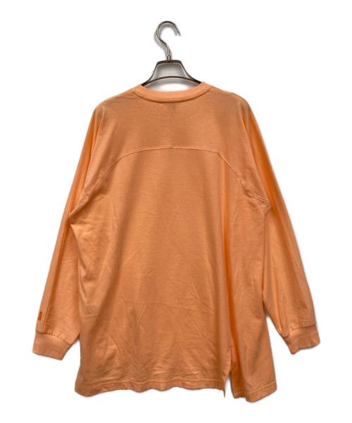 nagonstans（ナゴンスタンス）nagonstans (ナゴンスタンス) washable asymmetry 2way sleeves tops オレンジ サイズ:MEDIUMの古着・服飾アイテム