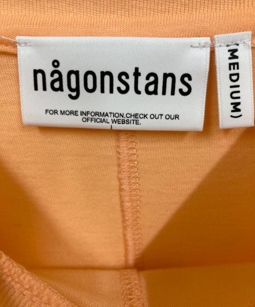 nagonstans（ナゴンスタンス）nagonstans (ナゴンスタンス) washable asymmetry 2way sleeves tops オレンジ サイズ:MEDIUMの古着・服飾アイテム
