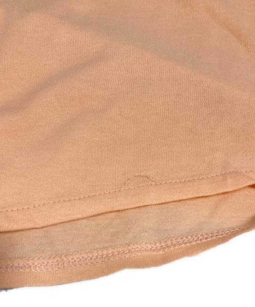 nagonstans（ナゴンスタンス）nagonstans (ナゴンスタンス) washable asymmetry 2way sleeves tops オレンジ サイズ:MEDIUMの古着・服飾アイテム