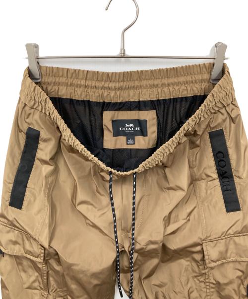 COACH（コーチ）COACH (コーチ) ライトウェイトテックカーゴパンツ カーキ サイズ:Lの古着・服飾アイテム