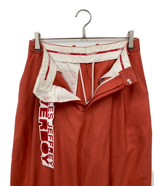 CHARLES JEFFREY LOVERBOY（チャールズ ジェフリー ラバーボーイ）CHARLES JEFFREY LOVERBOY (チャールズ ジェフリー ラバーボーイ) パンツ オレンジ サイズ:W30の古着・服飾アイテム