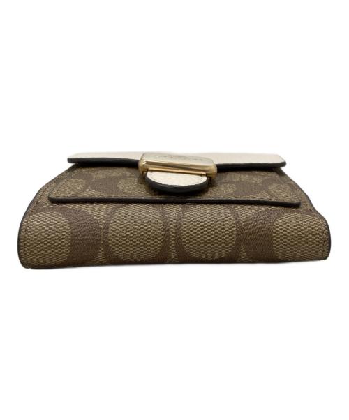COACH（コーチ）COACH (コーチ) 2つ折り財布 ベージュの古着・服飾アイテム