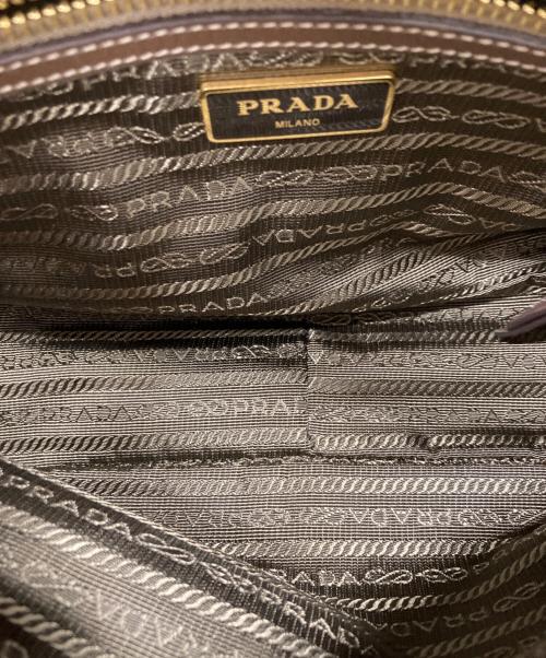PRADA（プラダ）PRADA (プラダ) キャンバスショルダーバッグ ベージュの古着・服飾アイテム