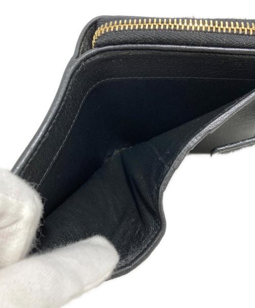 Yves Saint Laurent（イヴサンローラン）Yves Saint Laurent (イヴサンローラン) ロゴレザーラウンドジップウォレット ブラックの古着・服飾アイテム