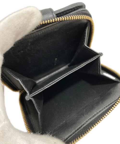 Yves Saint Laurent（イヴサンローラン）Yves Saint Laurent (イヴサンローラン) ロゴレザーラウンドジップウォレット ブラックの古着・服飾アイテム