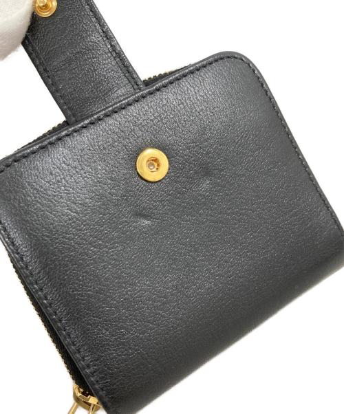Yves Saint Laurent（イヴサンローラン）Yves Saint Laurent (イヴサンローラン) ロゴレザーラウンドジップウォレット ブラックの古着・服飾アイテム