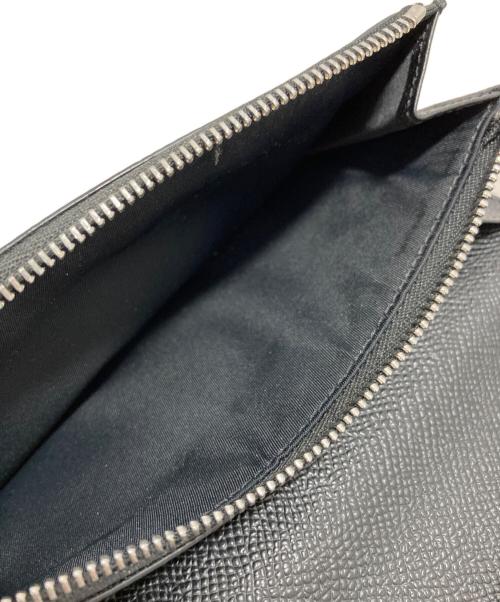 BURBERRY（バーバリー）BURBERRY (バーバリー) ロゴ型押しロングウォレット ブラックの古着・服飾アイテム