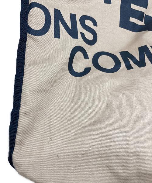 COMME des GARCONS（コムデギャルソン）COMME des GARCONS (コムデギャルソン) ロゴプリントホリデーシーズンメッセージバッグ ベージュの古着・服飾アイテム