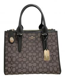 COACH（コーチ）の古着「シグネチャー トートバッグ」｜ブラック