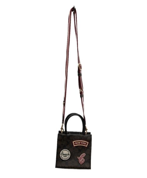 COACH（コーチ）COACH (コーチ) ミニ キャリー クロスボディ・シグネチャー キャンバス・スキー パッチ ブラウンの古着・服飾アイテム