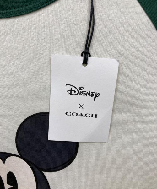 COACH（コーチ）COACH (コーチ) DISNEY (ディズニー) ラグランTシャツ ホワイト×グリーン サイズ:SMALL 未使用品の古着・服飾アイテム
