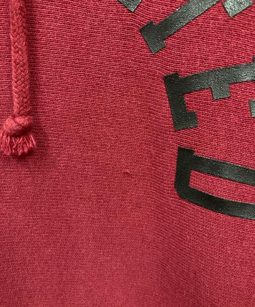 Champion（チャンピオン）Champion (チャンピオン) UNDEFEATED (アンディフィーテッド) パーカー レッド サイズ:MEDIUMの古着・服飾アイテム