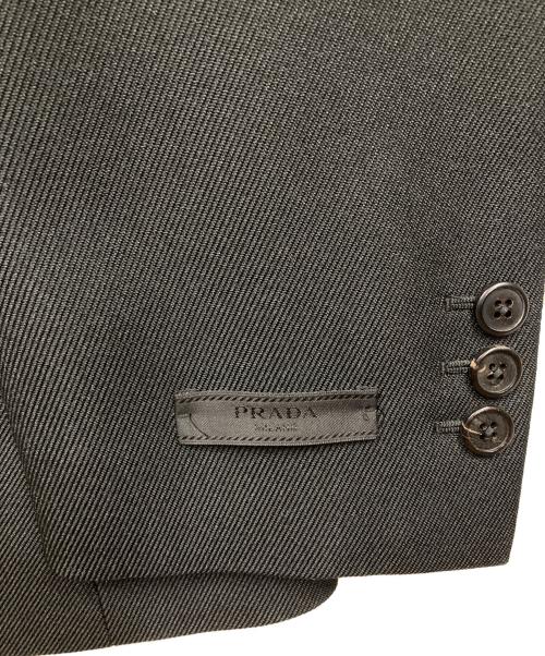 PRADA（プラダ）PRADA (プラダ) 袖タグデザインテーラードジャケット ブラック サイズ:48の古着・服飾アイテム