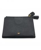 ANYA HINDMARCHアニヤ・ハインドマーチ）の古着「ピーピング アイズ スモール ダブルジップ ウォレット」｜レッド×ブラック