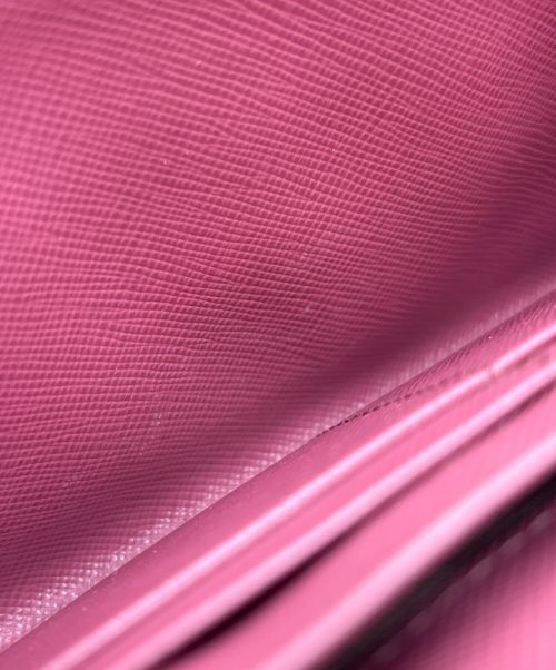 PRADA（プラダ）PRADA (プラダ) ラウンドファスナーリボン長財布 ピンクの古着・服飾アイテム
