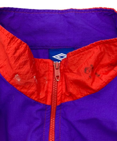 UMBRO（アンブロ）UMBRO (アンブロ) ハーフジップナイロンジャケット パープル×レッド サイズ:Mの古着・服飾アイテム