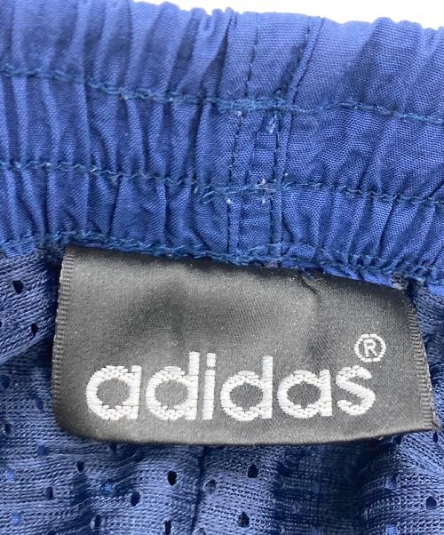 adidas（アディダス）adidas (アディダス) パフォーマンスロゴ90’Sナイロンパンツ ブルー サイズ:Lの古着・服飾アイテム