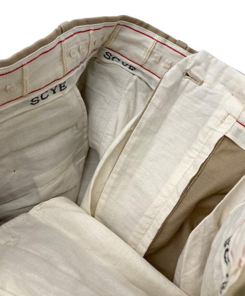 SCYEBASICS（サイベーシックス）SCYEBASICS (サイベーシックス) BASICS SAN JOAQUIN COTTON CHINO PLEATED TROUSERS ベージュ サイズ:36の古着・服飾アイテム
