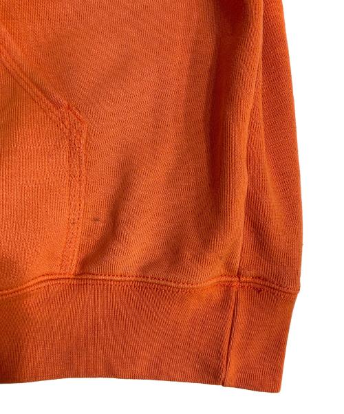 CarHartt（カーハート）CarHartt (カーハート) 袖プリントパーカー オレンジ サイズ:XLの古着・服飾アイテム