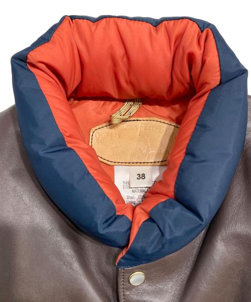 RockyMountainFeatherBed（ロッキーマウンテンフェザーベッド）RockyMountainFeatherBed (ロッキーマウンテンフェザーベッド) CHARI & CO NYC (チャリアンドコーニューヨーク) 別注ロゴ刺繍ダウンベスト ブラウン×ネイビー サイズ:Sの古着・服飾アイテム