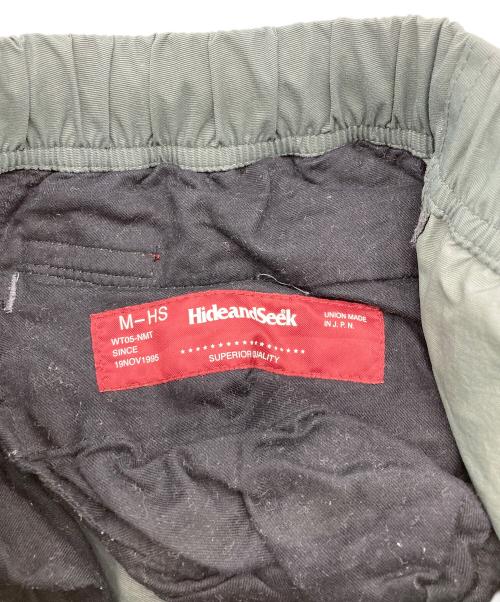 HIDE AND SEEK（ハイドアンドシーク）HIDE AND SEEK (ハイドアンドシーク) Nylon Track Pant カーキ サイズ:Mの古着・服飾アイテム