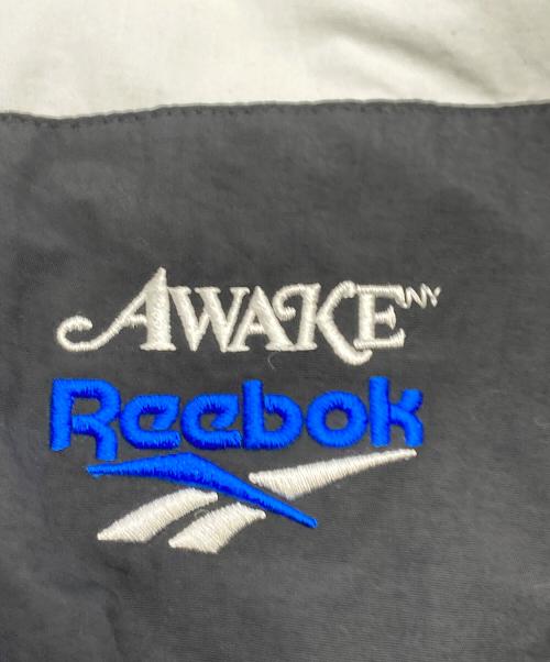 REEBOK（リーボック）REEBOK (リーボック) AWAKE (アウェイク) ナイロンジャケット ホワイト×ブルー サイズ:Lの古着・服飾アイテム