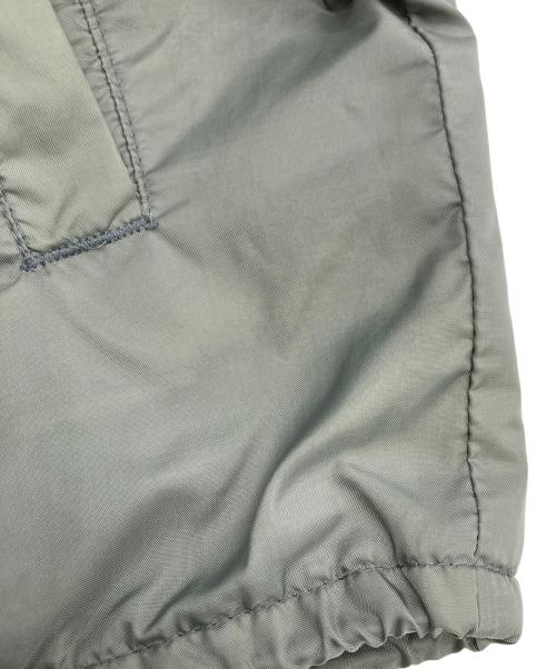 INDEPENDENT（インディペンデント）INDEPENDENT (インディペンデント) 00s アイアンクロス ナイロンジップパーカー カーキ サイズ:Lの古着・服飾アイテム