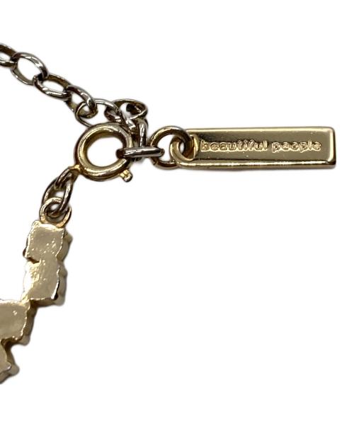 beautiful people（ビューティフルピープル）beautiful people (ビューティフルピープル) カラーグラススターダストブレスレット グリーンの古着・服飾アイテム