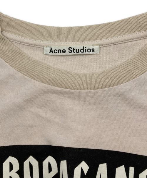 Acne studios（アクネ ストゥディオス）ACNE STUDIOS (アクネ ストゥディオス) MAGAZINE PRINT TEE ベージュ サイズ:Lの古着・服飾アイテム