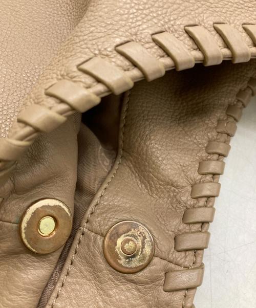 TORY BURCH（トリーバーチ）TORY BURCH (トリーバーチ) ホーボーバッグ ベージュの古着・服飾アイテム