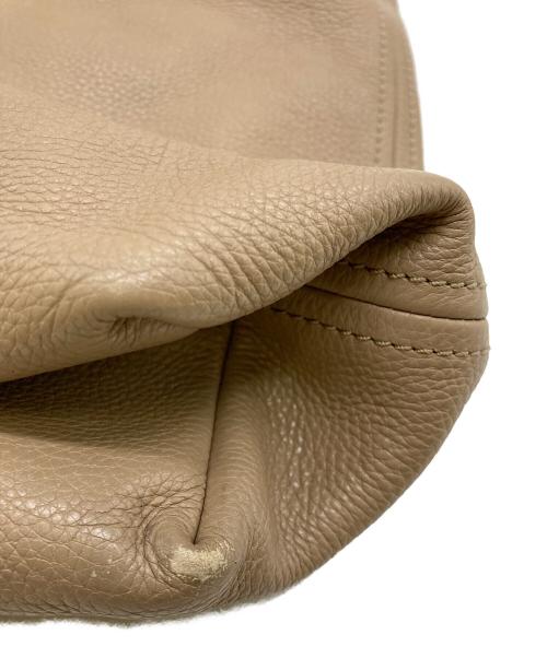 TORY BURCH（トリーバーチ）TORY BURCH (トリーバーチ) ホーボーバッグ ベージュの古着・服飾アイテム