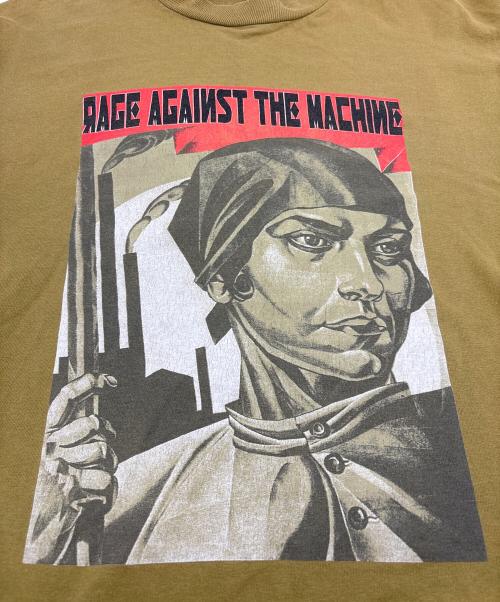 anvil（アンヴィル）anvil (アンヴィル) 90s Rage Against the Machine UNITED NATIONS REPORT 1980 グリーン サイズ:Lの古着・服飾アイテム