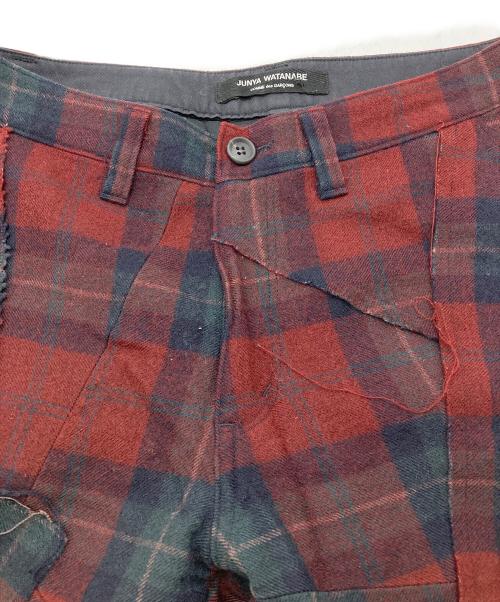 JUNYA WATANABE COMME des GARCONS（(ジュンヤワタナベ コムデギャルソン）JUNYA WATANABE COMME des GARCONS ((ジュンヤワタナベ コムデギャルソン) パッチワークチェックフレアパンツ【 AD2002】 レッド サイズ:Mの古着・服飾アイテム