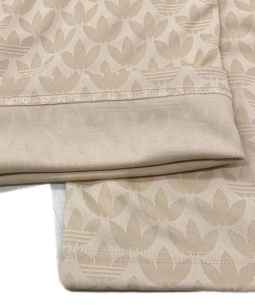 adidas（アディダス）adidas (アディダス) モノグラムトラックパンツ ベージュ サイズ:XL 未使用品の古着・服飾アイテム
