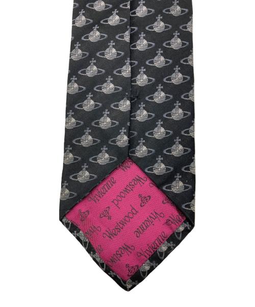 Vivienne Westwood（ヴィヴィアンウエストウッド）Vivienne Westwood (ヴィヴィアンウエストウッド) 総柄 オーブシルク ネクタイ ブラック サイズ:FREEの古着・服飾アイテム