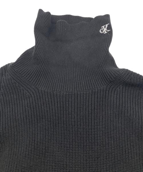 Calvin Klein Jeans（カルバンクラインジーンズ）Calvin Klein Jeans (カルバンクラインジーンズ) 首ロゴタートルネックニット ブラック サイズ:Mの古着・服飾アイテム